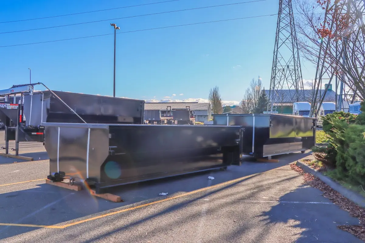Roll-off dumpster ready for waste disposal at job site for 15 Yard Dumpster Rental in Biloxi